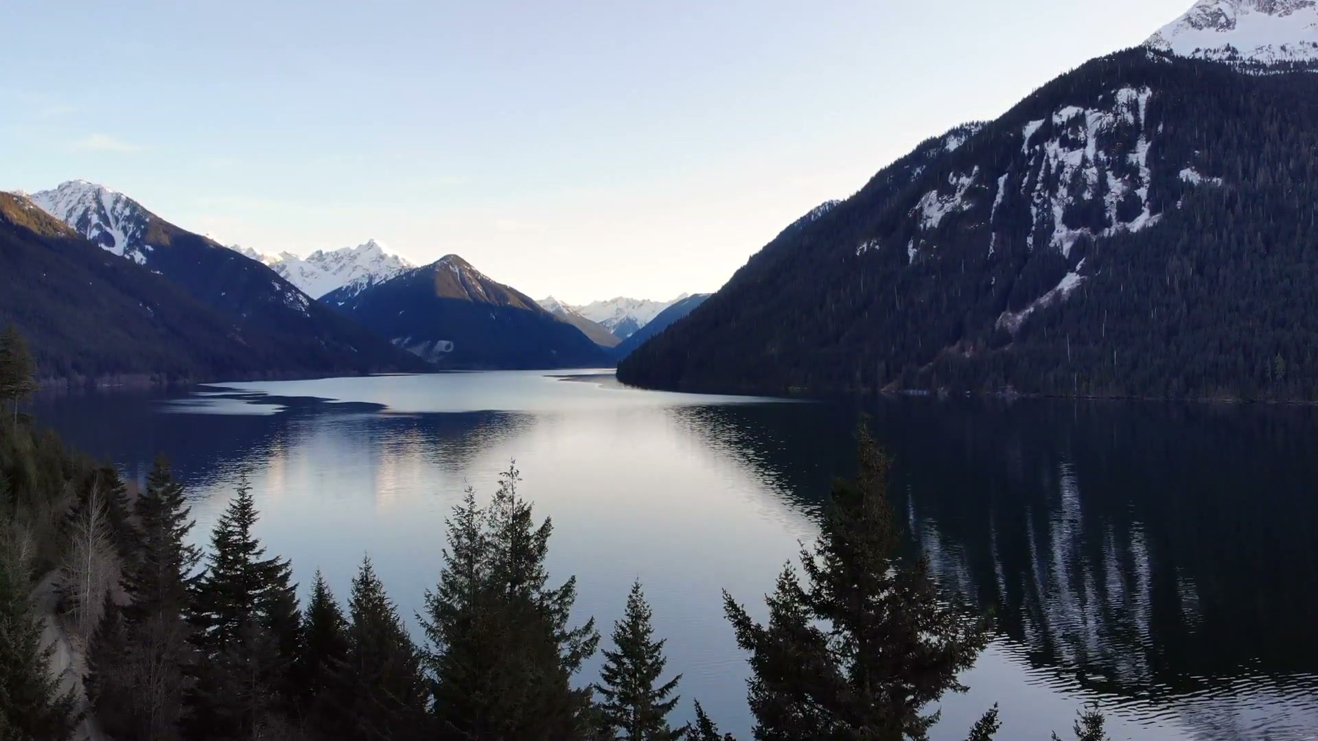 Chilliwack Lake and snow-capped peaks, filmed by drone